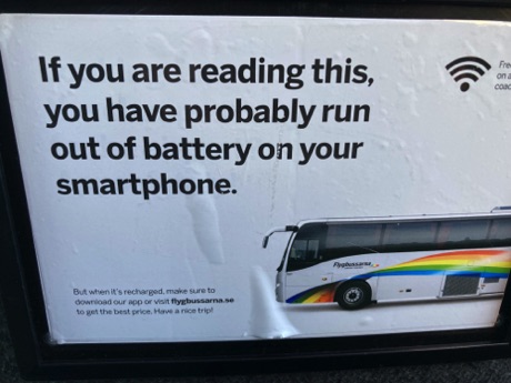 sign on back of a bus seat